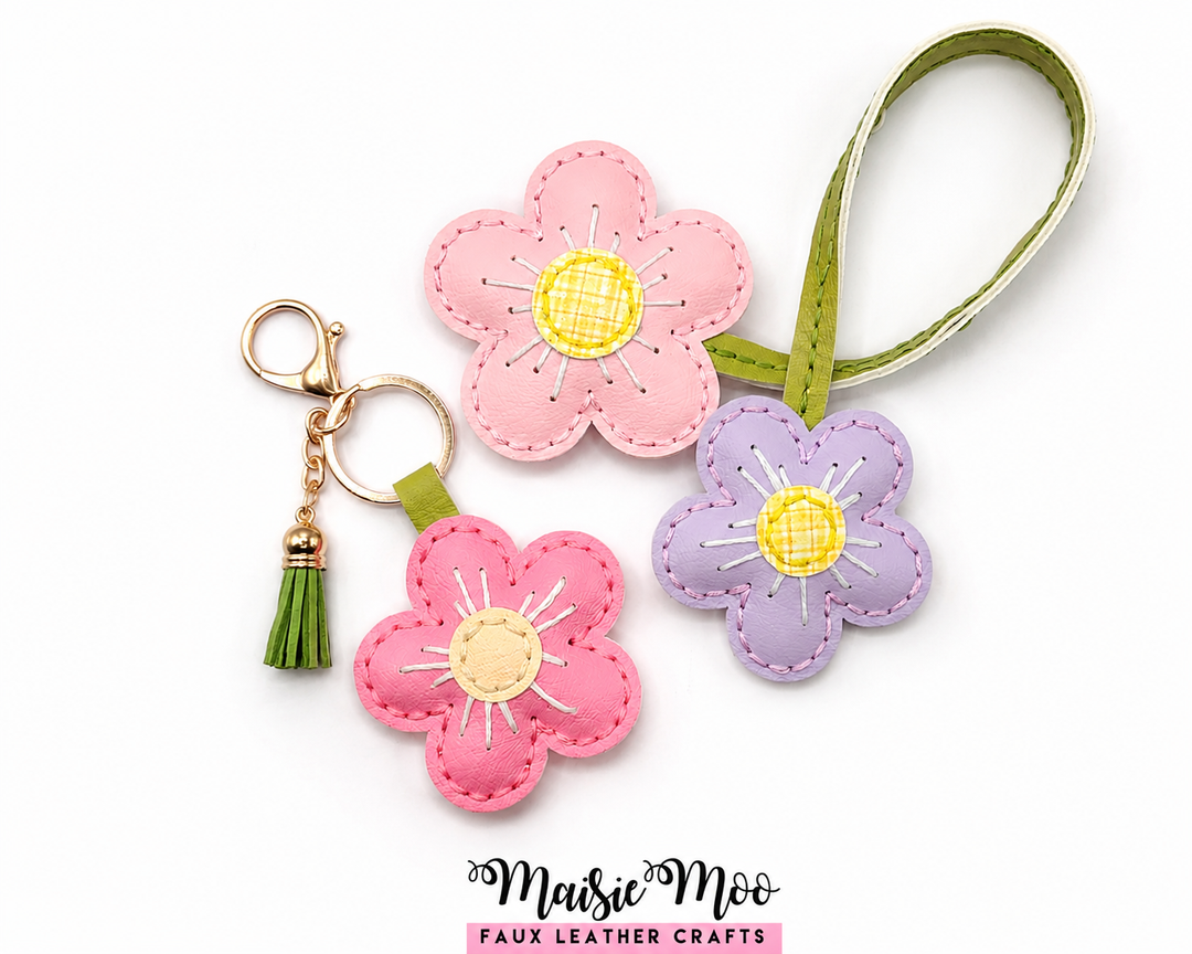 Flower Blossom Bag Charm SVG, Faux Leather Flower accessories in pink and purple designs with gold accents.