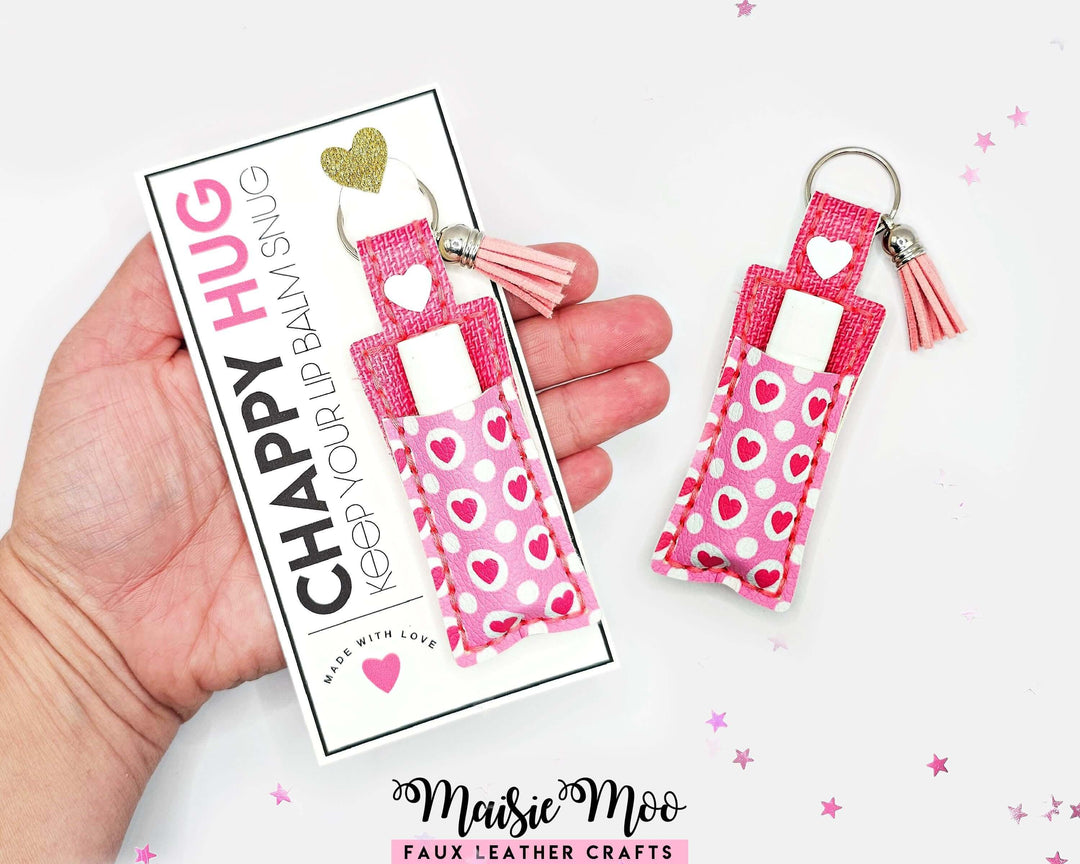 ChapStick Holder Keychain showcased with pink heart pattern and display card for easy gifting.