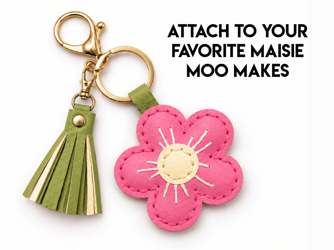 FREE Faux Leather Rivet Tassel Pattern – 4 Sizes keychain with pink flower and green tassel.