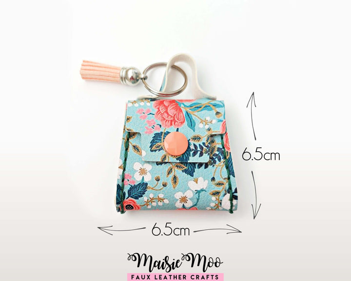 Purse Bag Charm Hand Sewing Pattern; cute mini purse bag charm in floral faux leather with keyring and tassel.