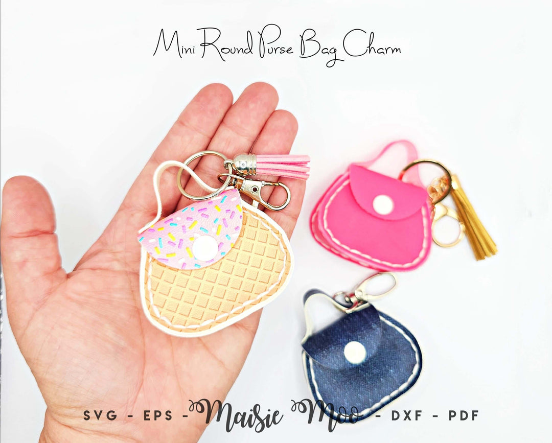 Mini Round Purse Bag Charm - Collection of colorful faux leather bag charms in hand.